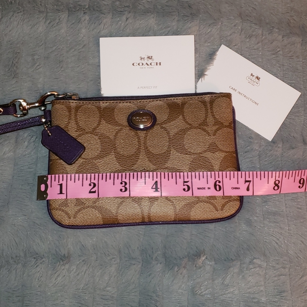 Purple and khaki coach wristlet